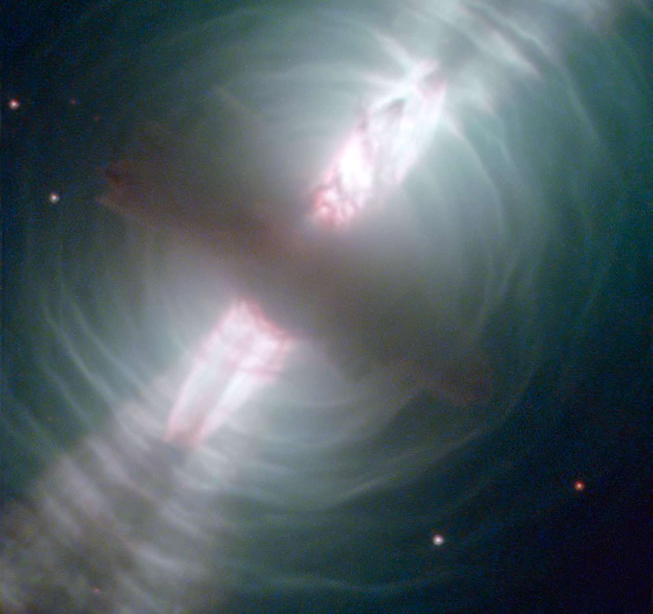 Hubble images searchlight beams from a preplanetary nebula