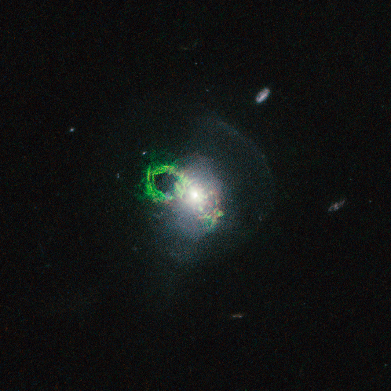 Hubble view of green filament in Teacup galaxy