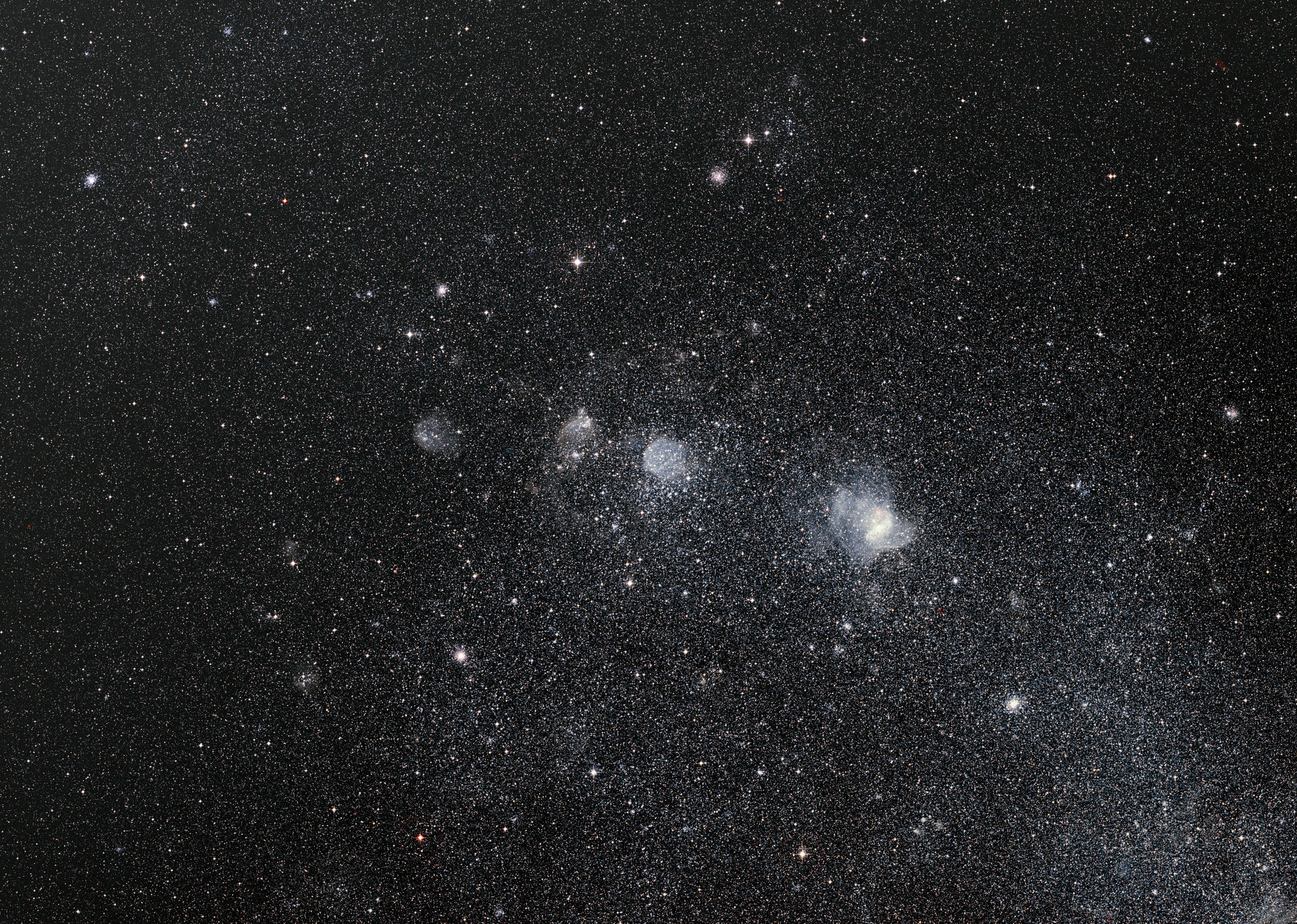 Wide-Field View of the Supernova Remnant 1E 0102.2-7219